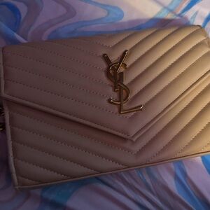 Tan ysl wallet cross body.